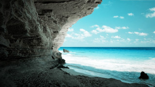 Person rock ocean cliff blue 2 - sense of depth free wallpaper for desktop