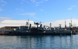 Large ship docked harbor background 2 - the background and a building in the background free wallpaper