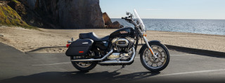 Motorcycle parked ocean cliff beach - cafer bater free wallpaper