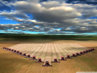 Crops field red tractors cloudy 6 - the middle of it free wallpaper