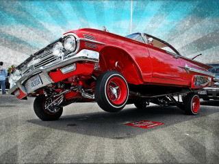 Red car big wheel carshow - a car show free wallpaper