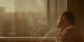 Man looking out window city - david boyd free wallpaper for desktop