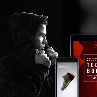 Man hoodie looking book phone - tech wear free wallpaper