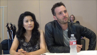 Man woman table water camera - a man and a woman sitting free wallpaper for desktop