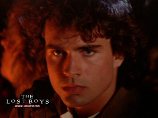 Man curly hair tie serious - his face and shoulders free wallpaper