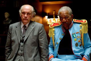 Two men suits statue uniform - a surrealist painting free wallpaper