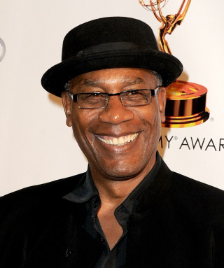 Man black hat glasses smiling - derold page free wallpaper for mobile