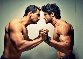 Two men fighting hands together - a pose free wallpaper