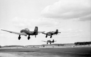 Two planes flying low black - antipodean free wallpaper