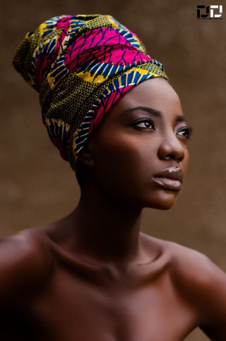 Woman head wrap brown background - chinwe chukwuogoroy free wallpaper for mobile