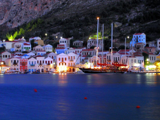 Harbor boats nighttime lights mountain - a harbor free wallpaper