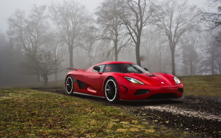 Red sports car foggy forest 2 - free cars wallpaper