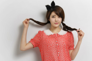 Woman ponytail holding hair posing - a ponytail free wallpaper