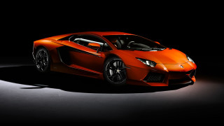 Orange sports car dark room 15 - nice looking orange sports car free wallpaper