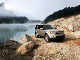 Silver land rover rocky cliff - a rocky cliff free wallpaper