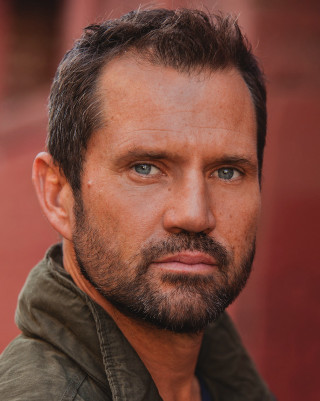 Man beard green jacket serious - clark voorhees free wallpaper for mobile