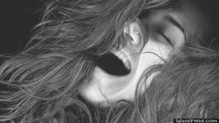 Woman blowing wind closed eyes - facial muscle free wallpaper