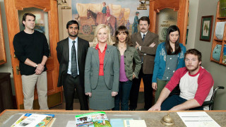 Group people table room painting - the wall behind them free wallpaper