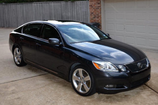 Black car driveway garage brick - a garage door free wallpaper