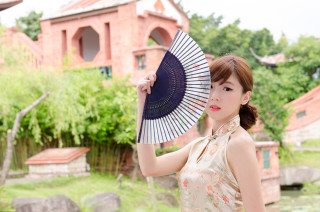Woman holding fan garden pond - a woman holding free wallpaper for desktop