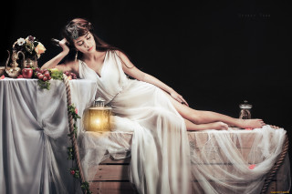 Woman white dress sitting bed 9 - a lantern free wallpaper for desktop