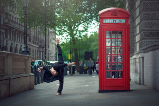 Man handstand phone booth city - david annand free wallpaper for desktop