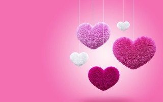 Hearts hanging strings pink background - a pink background free wallpaper for desktop