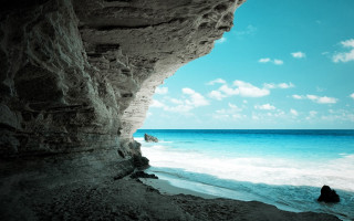 Person rock ocean cliff sky - sense of depth free wallpaper for desktop
