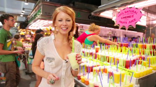 Woman holding cup juice store - a store free wallpaper