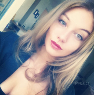 Woman blue eyes black shirt 6 - free portrait wallpaper for tablet