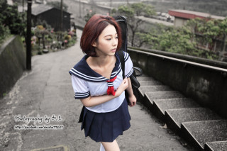 Woman backpack bowtie walking street - cosplay free wallpaper