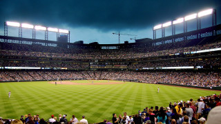 Baseball stadium crowd cloudy day - a baseball stadium free wallpaper