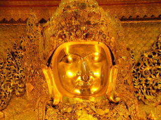 Golden buddha statue gold background - a gold background free wallpaper for desktop