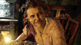 Woman sitting table food candle - a plate of food in front free wallpaper