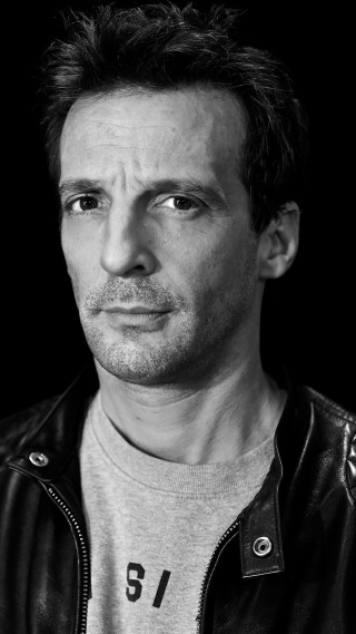 Man leather jacket serious look 5 - his face and shoulders free wallpaper