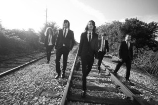 Men suits walking train tracks - art brut free wallpaper for desktop