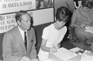 Man woman signing papers table - edna mann free wallpaper