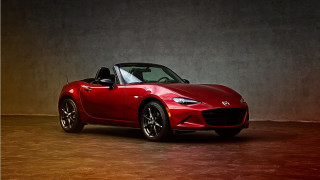 Red sports car dark room 104 - sign free wallpaper for desktop