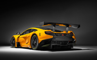 Yellow sports car dark room 2 - a yellow sports car free wallpaper