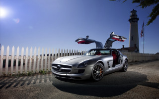 Silver sports car lighthouse doors - chrome free wallpaper