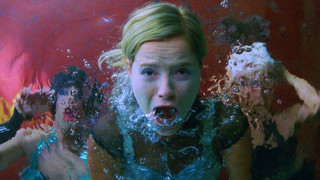 Woman submerged water hands mouth - her mouth free wallpaper