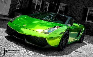 Green sports car brick building - a brick building free wallpaper