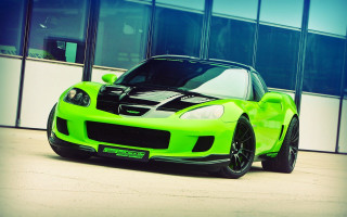Green sports car city building - a green sports car free wallpaper for desktop
