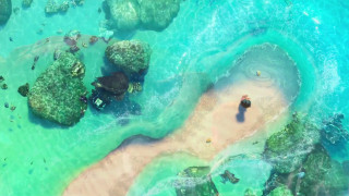 Beach person water rocks formation - a beach next free wallpaper