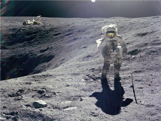 Astronaut moon walking vehicle background - an astronaut free wallpaper