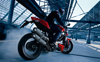 Man riding red motorcycle night - a red motorcycle free wallpaper