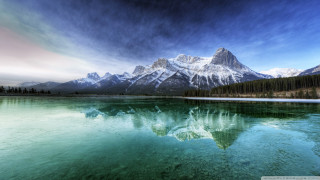 Mountain reflection lake forest background 2 - the water of a lake free wallpaper
