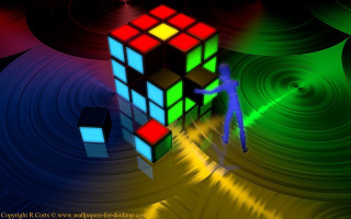 Person standing rubik cube colorful - ernő rubik free wallpaper