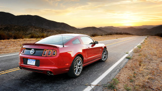 Red mustang driving desert sunset - a red mustang mustang free wallpaper
