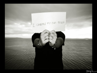 Woman holding sign craves own - front of her face free wallpaper